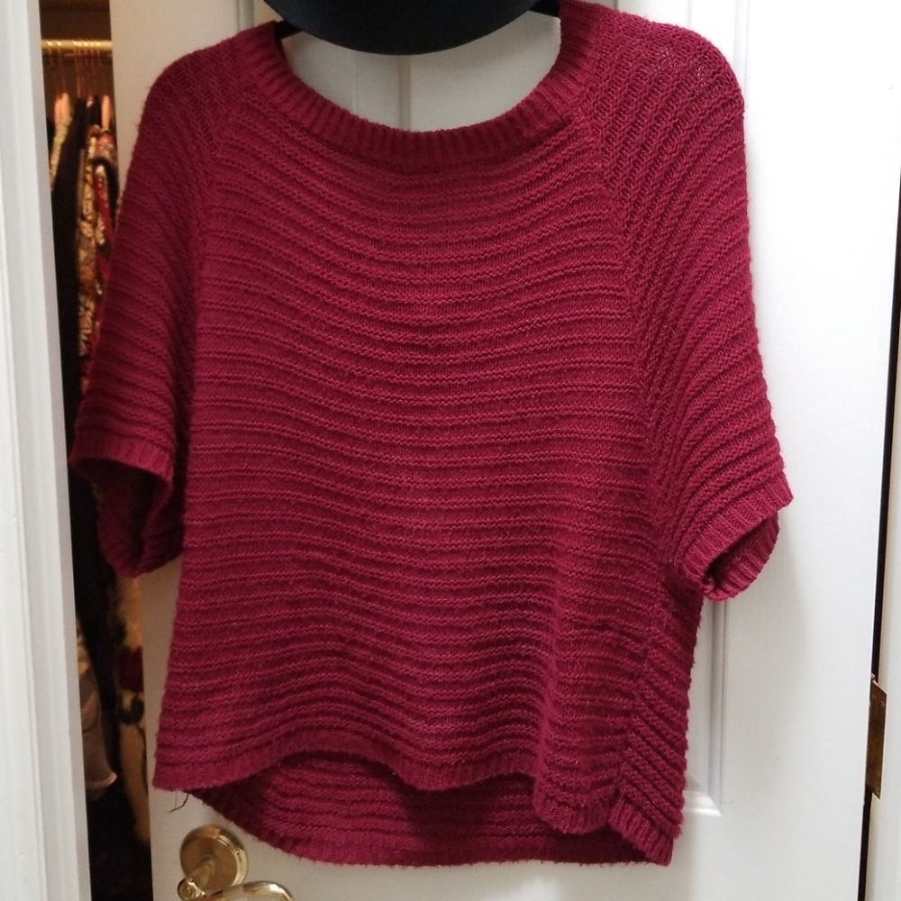 Red short sleeve sweater with bow ties back